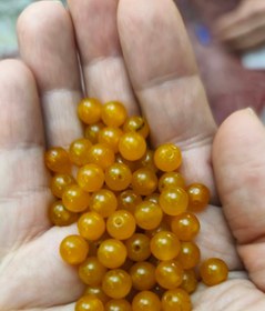 تصویر مهره سنگ جید زرد ۶میل اصل معدنی سوراخ دار 