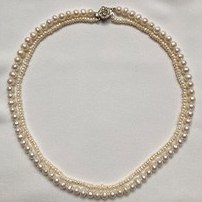 تصویر گردنبند مروارید اصل دو ردیف گل Original pearl necklace with silver flower lock