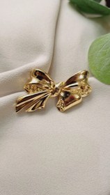 تصویر گل سینه برنجی 