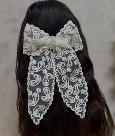 تصویر گلسر پاپیون دار تزئینی 