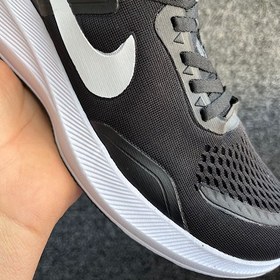 تصویر کتانی زنانه نایکی مدل 963 با رویه بافت و زیره نرم 