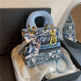 تصویر کیف مجلسی طرح دار 