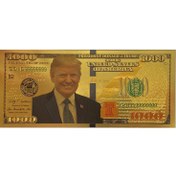 تصویر اسکناس 1000 دلار آمریکا طرح دونالد ترامپ روکش آب طلا 
