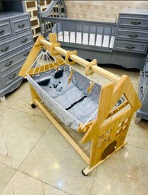 تصویر گهواره سنتی کلبه 