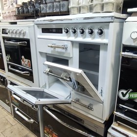 تصویر اجاق گاز چند درب طرح فر رو استیل 