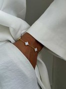 تصویر دستبند ونکلیف سفید و طلایی 