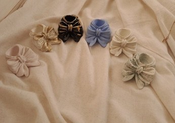 تصویر جا شمعی سنگی پاپیونی 