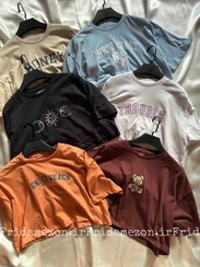 تصویر کراپ دخترانه وارداتی مدل اورسایز با طرح نوشته و عروسکی 