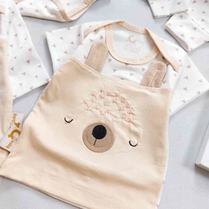 تصویر فروشگاه لباس نوزاد و کودک نی نی ماه