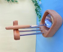 تصویر جاقاشقی چوب راش کنار گاز spoon holder