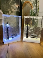 تصویر چراغ خواب فانتزی شب برفی با نور ملایم 