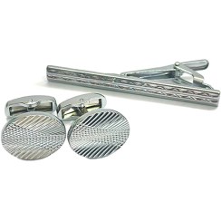 تصویر ست دکمه و گیره کراوات نقره‌ای - مدل طرح دار بیضی 