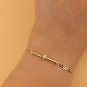 تصویر دستبند طلا ظریف با گوی مرکزی | ترکیبی از ظرافت و درخشش خاص 