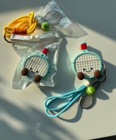 تصویر ایرپاد راکت تنیس همراه با اویز توپ ، و راکت Ball Tennis Airpad