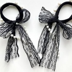 تصویر کش پاپیونی مرواریدی 