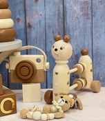 تصویر خرس شکم حلقه ای اسباب بازی چوبی رنگ نسکافه ای قهوه‌ای چوب روس 