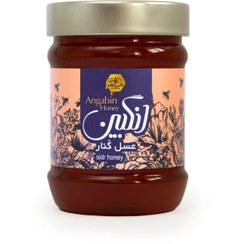 تصویر عسل ۵۰۰ گرمی کنار 