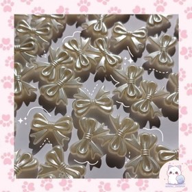 تصویر مهره پاپیون صدفی 