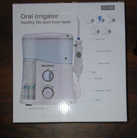 تصویر دستگاه شست و شوی دهان و دندان (نایس فیل) Oral irrigator