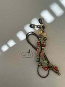 تصویر بندعینک مهره‌ای قهوه‌ای 