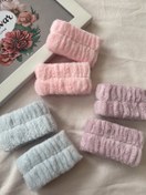 تصویر مچ بند حوله‌ای 