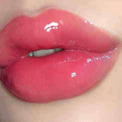 تصویر برق لب شاینی صورتی با تقویت کننده لب حاوی روغن لب آلوئه ورا بسیار خوش رنگ برند 3Q beauty 3Q beauty lip oil