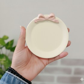 تصویر قالب سیلیکونی سینی گرد، مدل پاپیون، قطر ۹/۵ سانتیمتر 