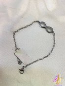 تصویر دستبند نقره ای طرح بی نهایت 