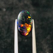 تصویر نگین اپال مشکی تراش اوال سایز ۹*۱۶ 