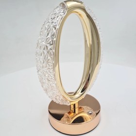 تصویر چراغ خواب و دکوری کریستالی بیضی Bedside lamp and oval crystal decoration