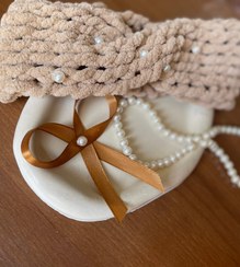 تصویر هد بند سر مرواریدی با نخ ترک 