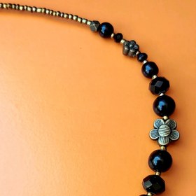 تصویر بند عینک مشکی طلایی 