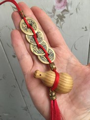 تصویر رشته سکه 4 تایی با کدو چوبی بدون حتی یک گره 