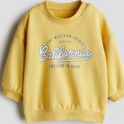 تصویر دورس نوزادی زرد H&M 