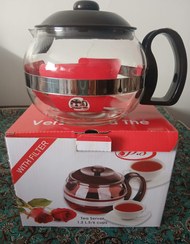 تصویر قوری پیرکس 1.2 لیتر ،همراه 10 گرم چای ماسالا 1.2 liter Pyrex teapot, with 10 grams of masala tea