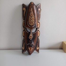 تصویر آویز دیواری مدل ماسک(نقاب)چوبی سرخپوستی(آفریقایی)کد hm 035 ا Aviz divari mask ya neghab chobi Aviz divari mask ya neghab chobi