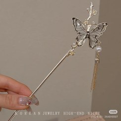 تصویر كانزاشي پروانه مشكي 