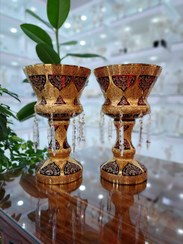 تصویر شمعدان کریستال طلاکوب آویزدار سایز بزرگ طرح ونوس رنگ قرمز مجموعه دوعددی 