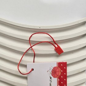 تصویر نخ پلمپ قرمز 