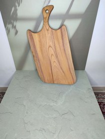 تصویر تخته گوشت دسته دار 