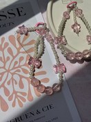 تصویر آویز مروارید و پاپیون 