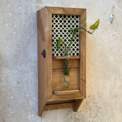 تصویر کاور لوله گاز چوبی حصیری دارای گلدان 