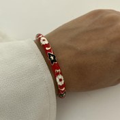 تصویر دستبند / بنگل میناکاری طرح گل رنگ مشکی و سفید 