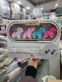 تصویر آویز تخت کودک طرح تک شاخ 