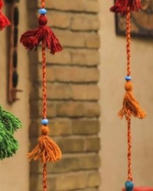 تصویر ریسه پشمی منگوله دار سنتی 