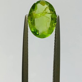 تصویر نگین زبرجد اصل آفریقا سایز 10*8 تراش بیضی 