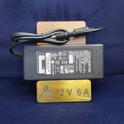تصویر آداپتور بین راهی پلاستیکی ۱۲ ولت ۶ آمپر با کابل 