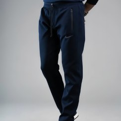 تصویر شلوار ورزشی مردانه مدل NIKE پارچه غواصی خارجی راسته در 2 رنگ جذاب - سرمه‌ای / L 