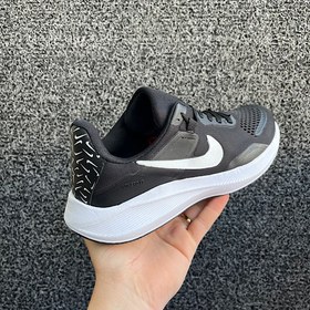 تصویر کتانی زنانه نایکی مدل 963 با رویه بافت و زیره نرم 