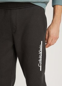 تصویر شلوار جگرز با کمر کشی و جزئیات لوگو برند Calvin Klein Logo Detail Waist Band Joggers